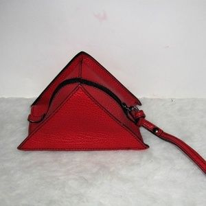 Small little red purse with handle; leather